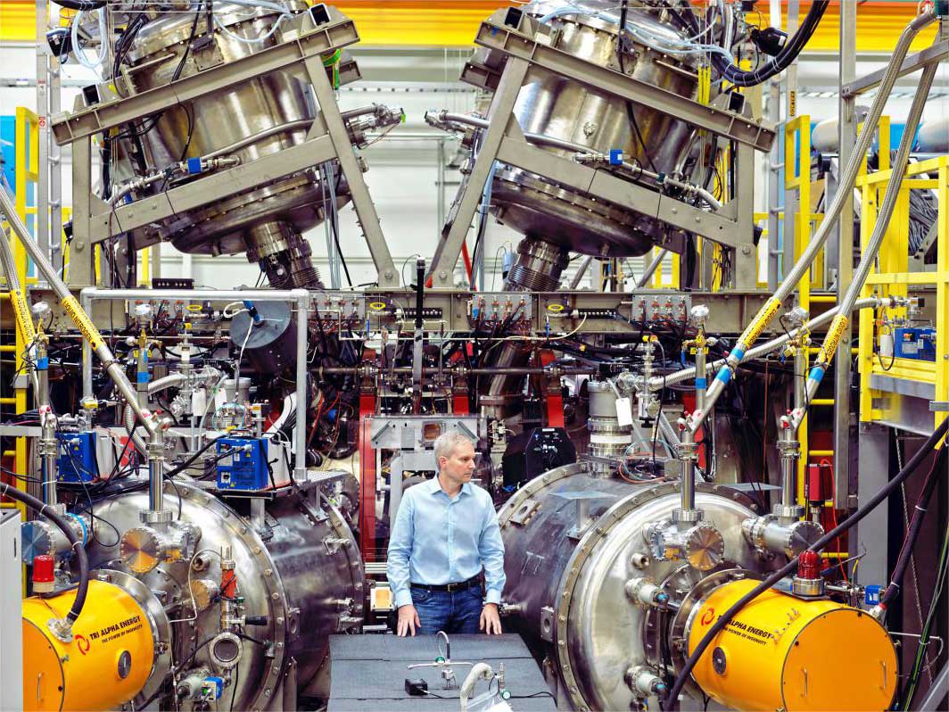 Dr. Michl Binderbauer, Tri-Alpha Energy’s CTO, near the core of his firm’s fusion reactor in Foothill Ranch, Calif.